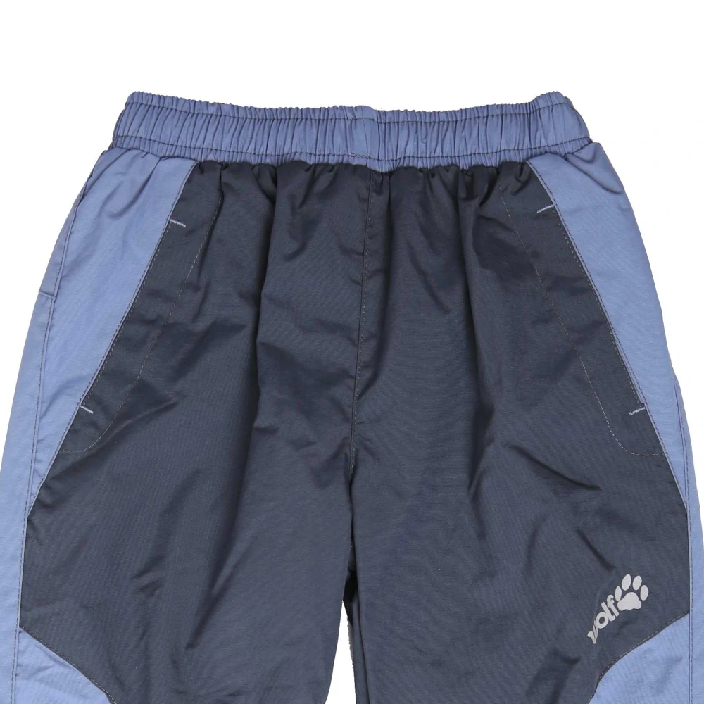 Zateplené šusťákové kalhoty WOLF B2171 šedé