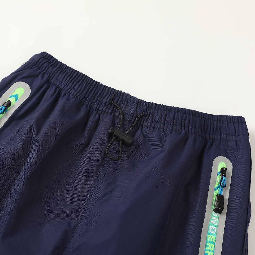 Chlapecké zateplené šusťákové kalhoty KUGO DK7127, tmavě modré