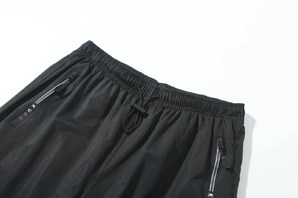 Dětské zateplené šusťákové kalhoty Kugo DK8505 černé