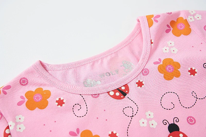 Dívčí šaty kr.r. Wolf S2514B světle růžové s beruškami