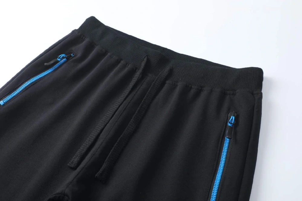 Chlapecké tepláky Kugo FT7053 černé / modrá aplikace