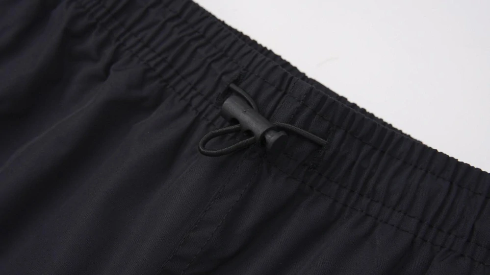 Dívčí šusťákové kalhoty zateplené Kugo DK8235 tmavě modrá / růžový zip