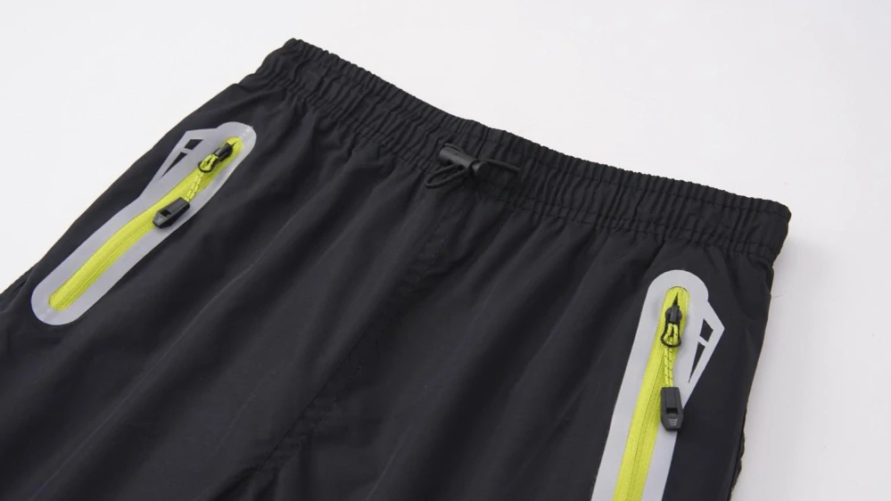 Dětské šusťákové kalhoty zateplené Kugo DK8235 černošedé / modrý zip