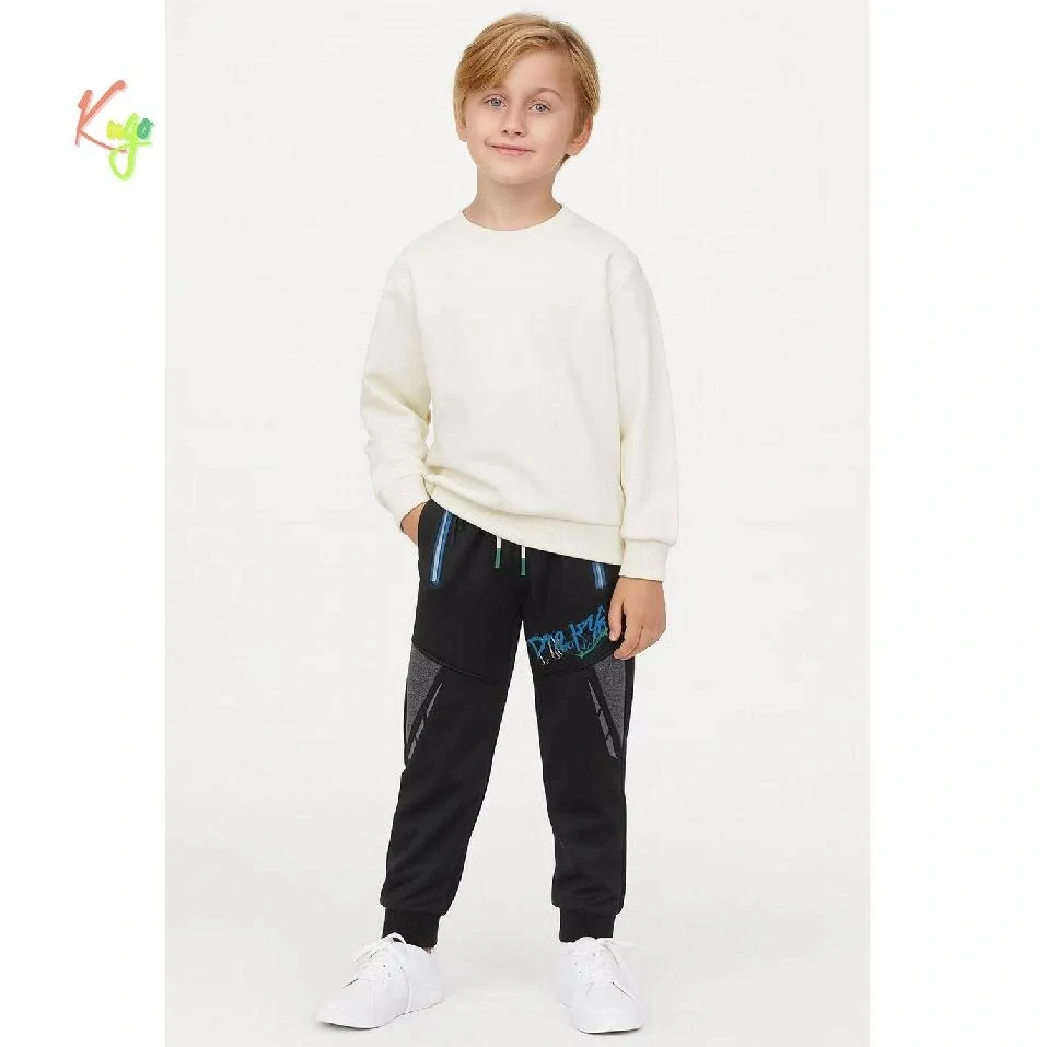 Teplé softshellové tepláky chlapecké Kugo GK8639 černé