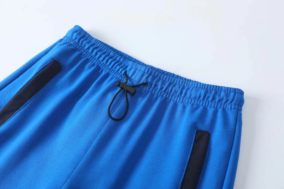 Bavlněné chlapecké kraťasy Kugo FS7035 modré s dinem