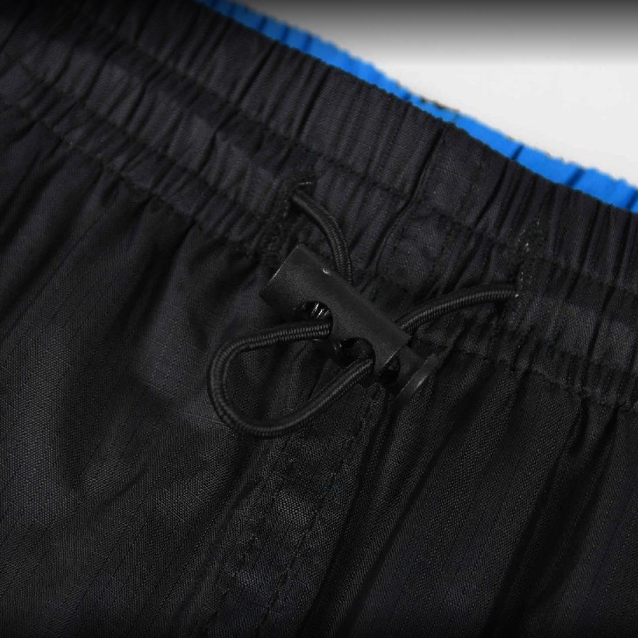 Šusťákové kalhoty s bavlněnou podšívkou KUGO SK7736, tyrkysové