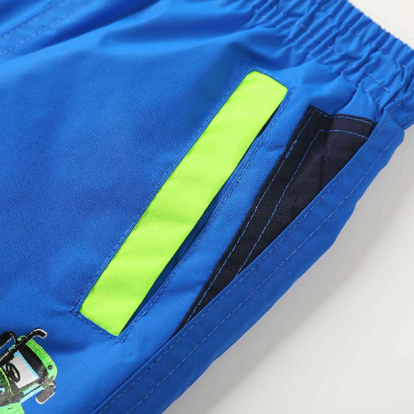 Chlapecké zateplené šusťákové kalhoty KUGO DK7119, tyrkysové