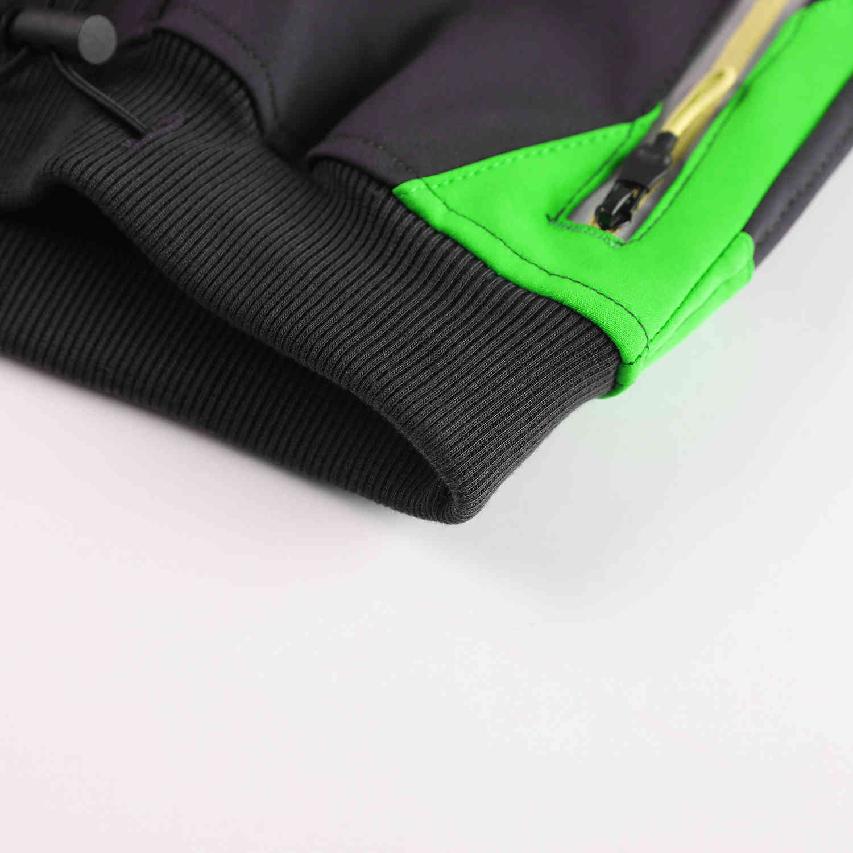 Chlapecké softshellové kalhoty nezateplené Kugo HK2870, černé se zelenou