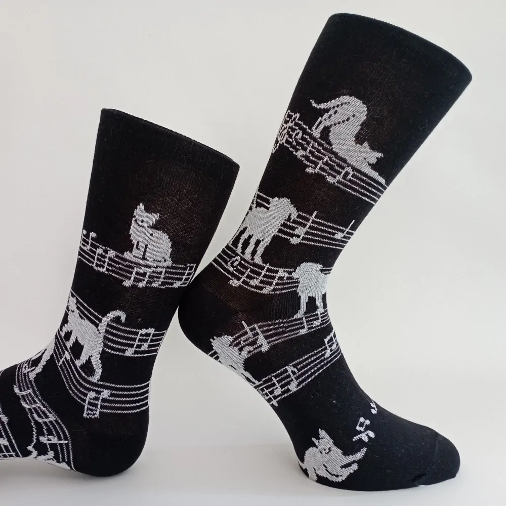 Dámské ponožky s ruličkovým lemem Trepon Mozart, černé