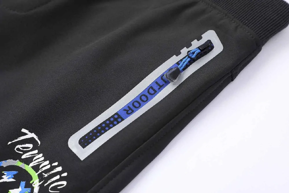 Chlapecké softshellové kalhoty nezateplené Kugo HK5655 tm. šedé