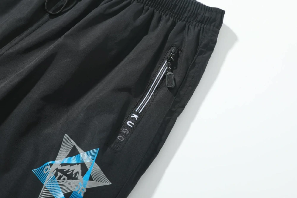 Dětské zateplené šusťákové kalhoty Kugo DK8505 černé