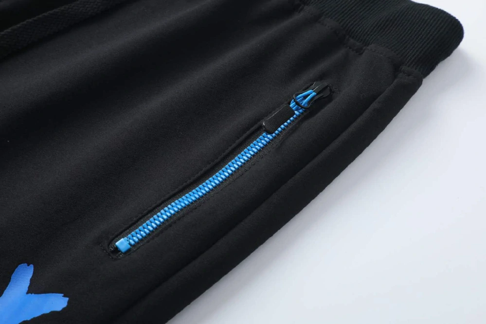 Chlapecké tepláky Kugo FT7053 černé / modrá aplikace