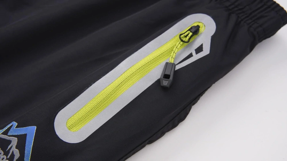 Dětské šusťákové kalhoty zateplené Kugo DK8235 černošedé / modrý zip