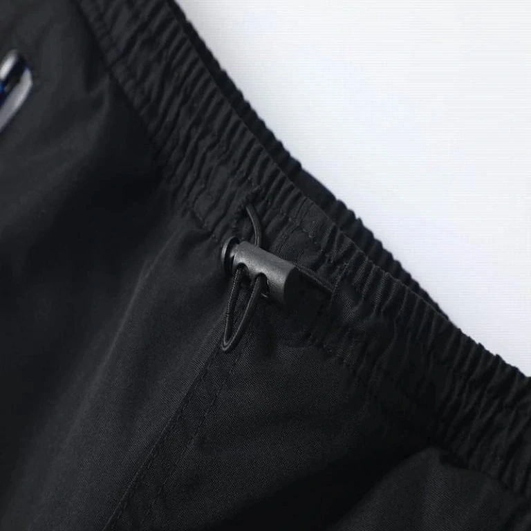 Chlapecké šusťákové kalhoty zateplené Kugo BU620 černé