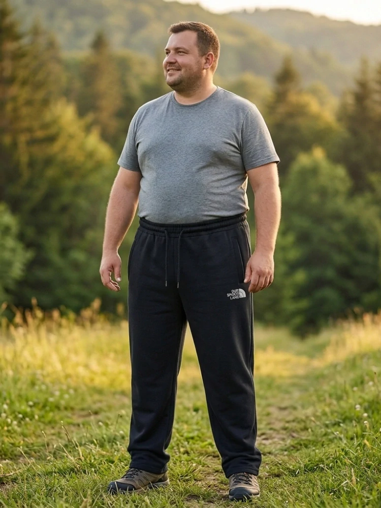 Moderní pánské rovné tepláky Kugo ZT8843 černé