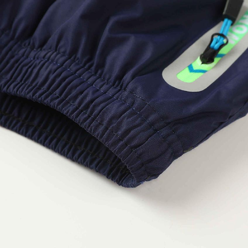 Chlapecké zateplené šusťákové kalhoty KUGO DK7127, tmavě modré