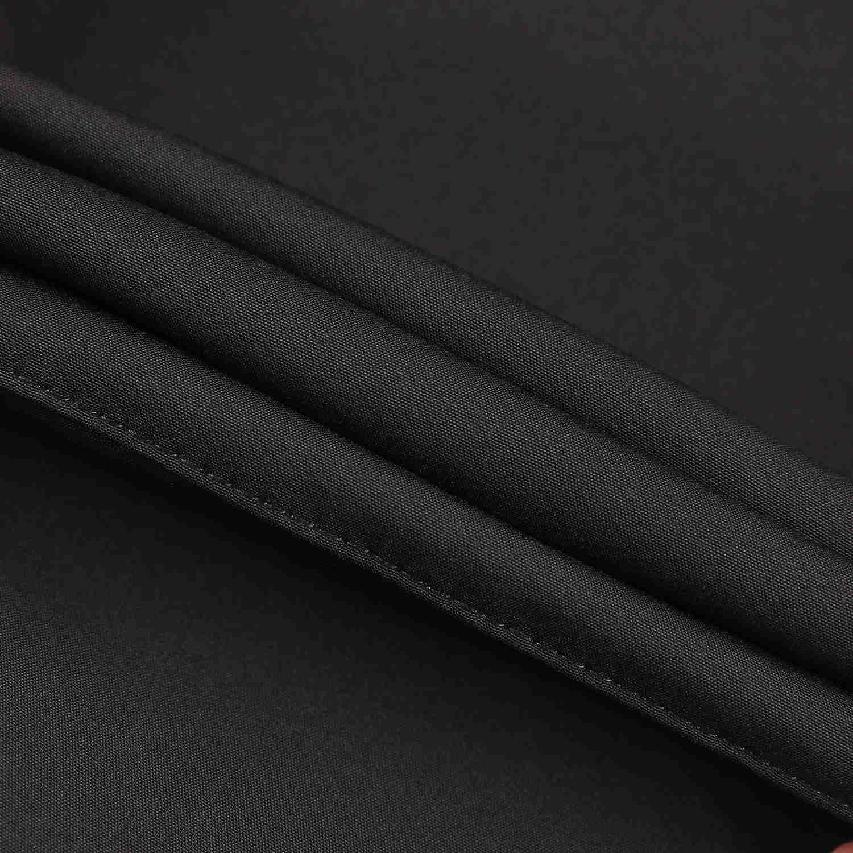 Chlapecké softshellové kalhoty nezateplené Kugo HK2870, černé se zelenou