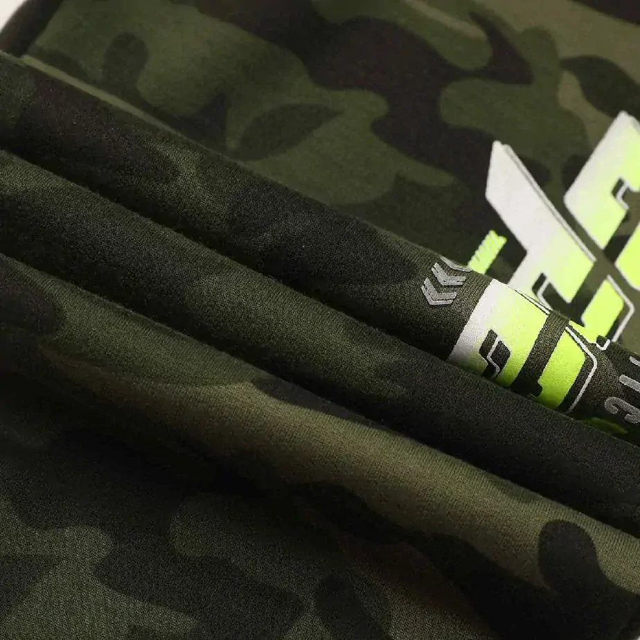 Chlapecké maskáčové tepláky Kugo TM9222, zelené