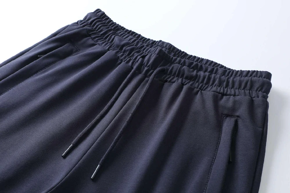 Moderní pánské rovné tepláky Kugo ZT8843 tmavě modré