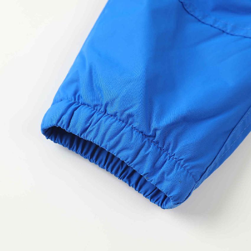 Chlapecké zateplené šusťákové kalhoty KUGO DK7119, tyrkysové