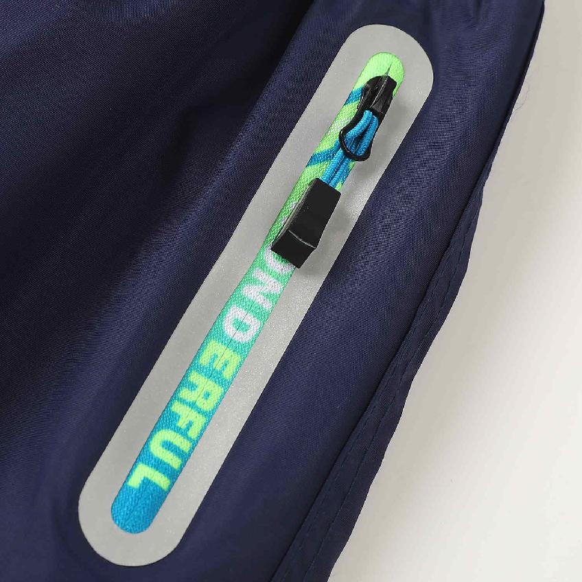 Chlapecké zateplené šusťákové kalhoty KUGO DK7127, tmavě modré