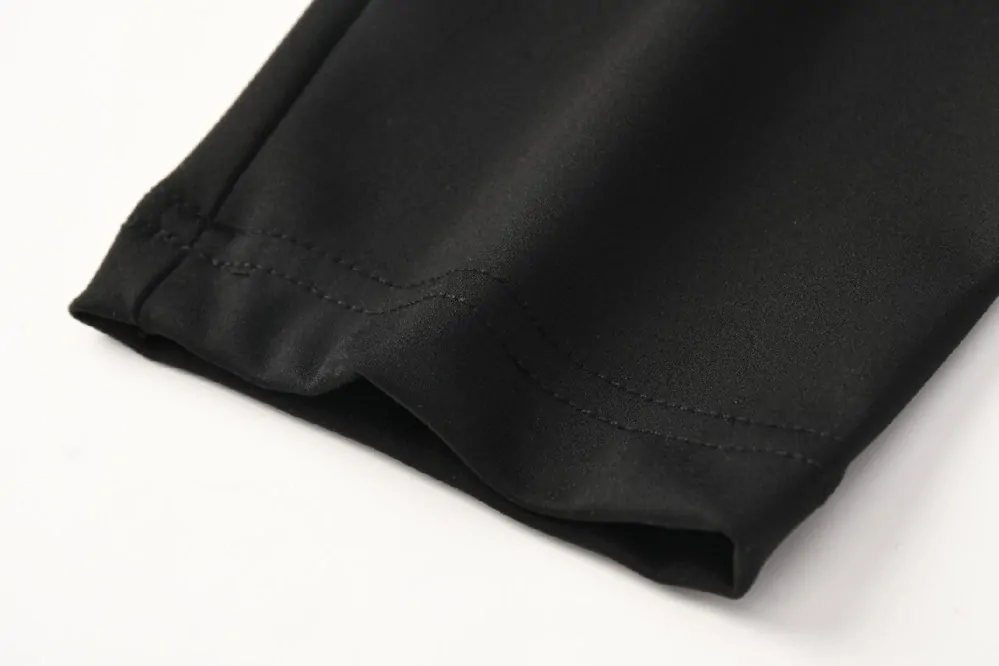 Dámské funkční legíny Kugo JK8618, černé / zelený nápis