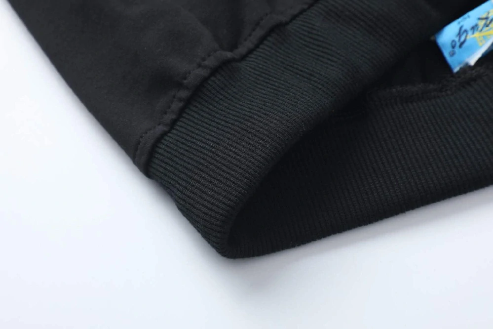 Chlapecké tepláky Kugo FT7053 černé / zelená aplikace