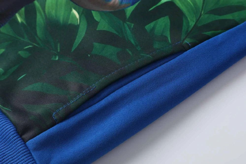 Teplá chlapecká mikina Kugo PT2510 s dinosaurem modrá