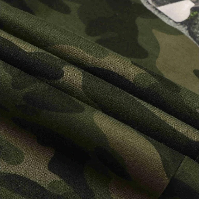 Dětské maskáčové tepláky Kugo TM9221 zelené s traktorem