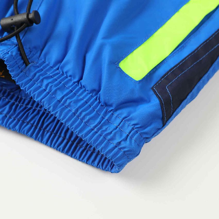 Chlapecké zateplené šusťákové kalhoty KUGO DK7119, tyrkysové