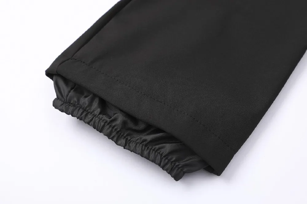 Chlapecké softshellové kalhoty nezateplené Kugo HK5657, černé