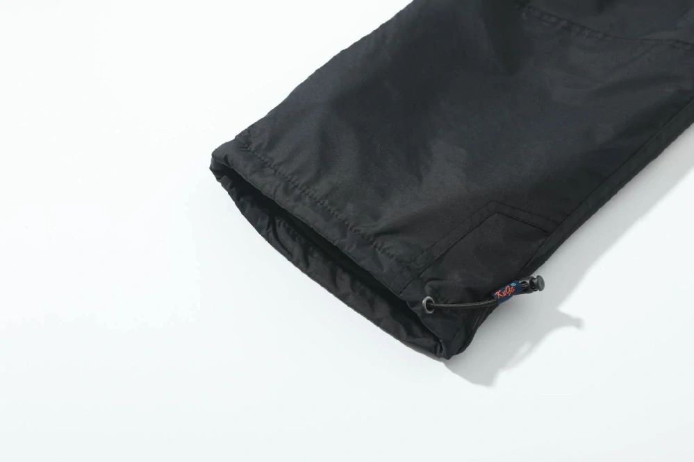 Dětské zateplené šusťákové kalhoty Kugo DK8505 černé