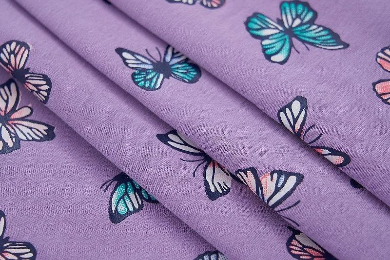 Dívčí šaty kr.r. Wolf S2514 fialové s motýly