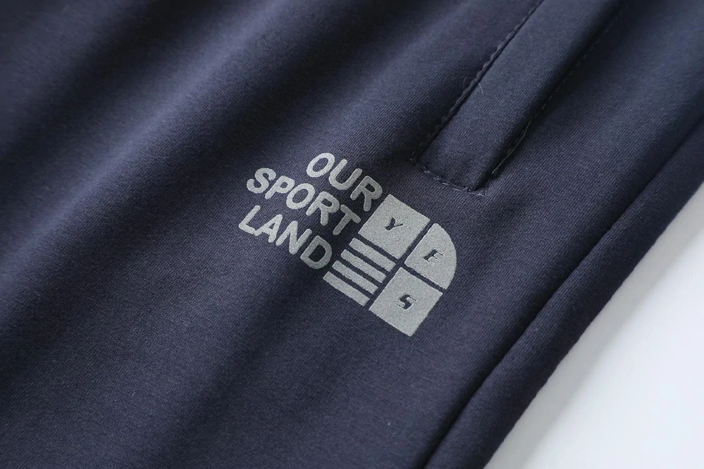 Moderní pánské rovné tepláky Kugo ZT8843 tmavě modré