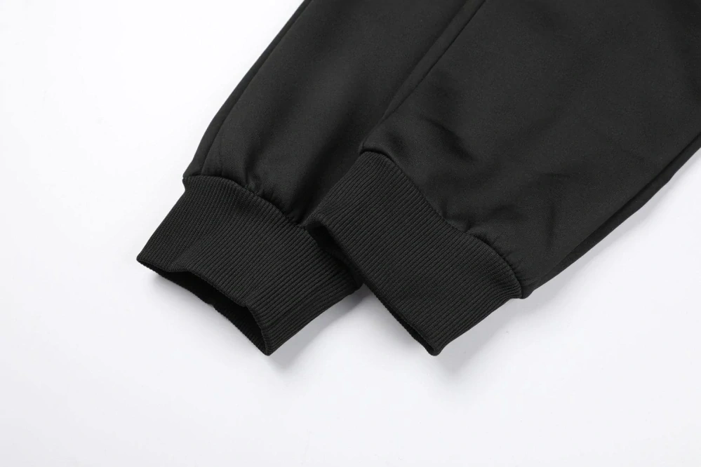 Teplé softshellové tepláky dětské Kugo GK8655 černé
